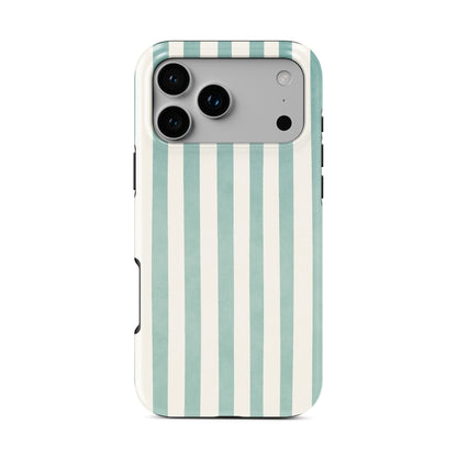 Mint MagSafe tough phone case with soft green and cream vertical stripes on a glossy dual layer coastal phone case by Case & Charm.