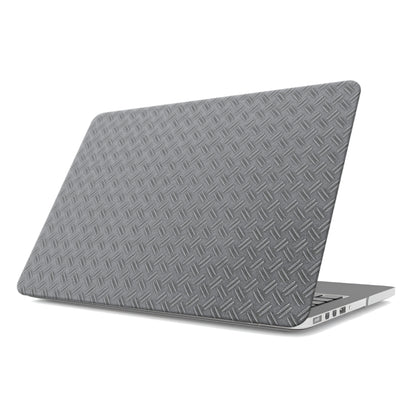 Titan Treadwork MacBook case with grey metal tread pattern and slim matte hard shell finish