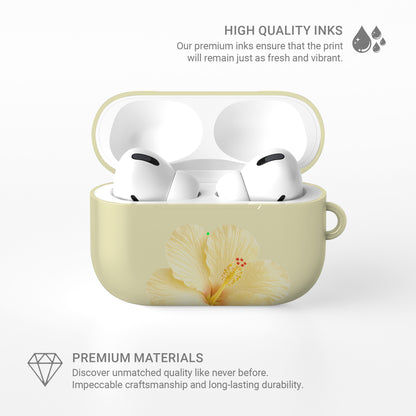 Yellow hibiscus AirPods case with soft lemon floral print on a glossy Apple AirPods case by Case & Charm.