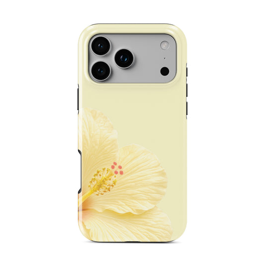 Yellow floral MagSafe phone case featuring a large cream hibiscus bloom on a pale lemon background with a soft tropical botanical look.