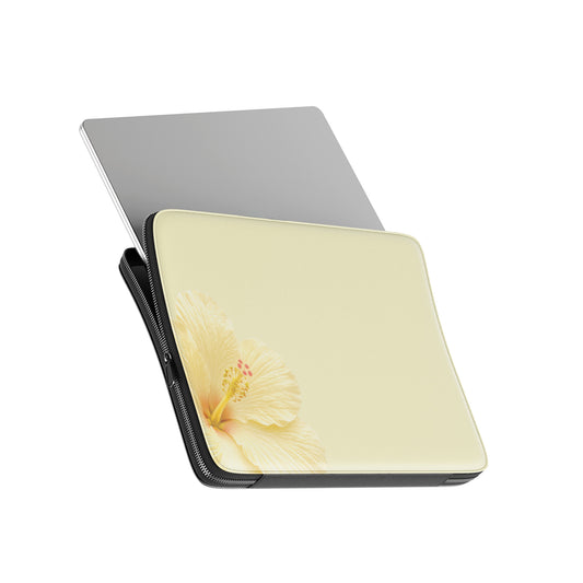 Yellow hibiscus laptop sleeve with soft floral print on a vegan leather laptop case by Case & Charm.