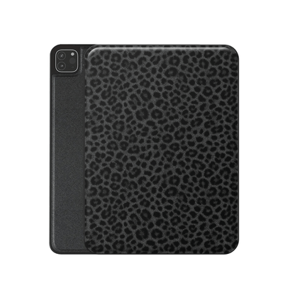 Panthera Eclipse iPad Case with dark leopard print, vegan leather exterior and Apple Pencil holder.