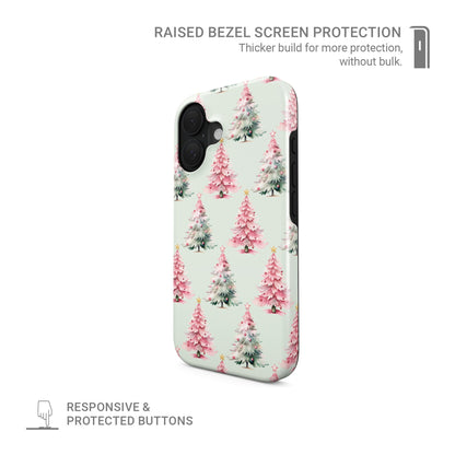 Glossy tough phone case with repeating pink and mint Christmas trees on a soft pastel background, Case & Charm Peppermint Pines design