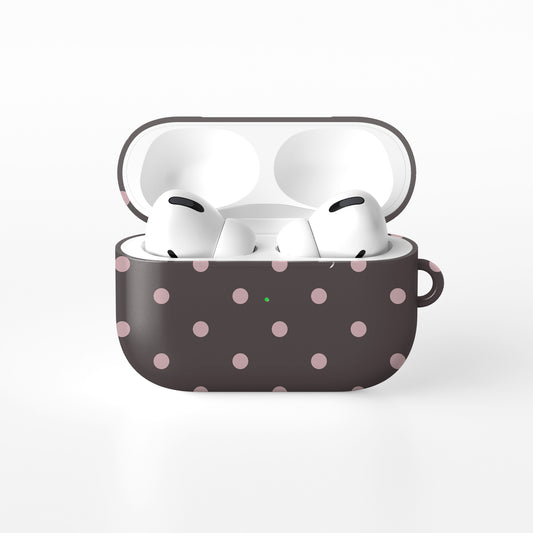Strawberry Drops AirPods Case featuring small strawberry-pink polka dots on a rich cocoa-brown background.