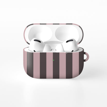 Strawberry Wafer AirPods Case featuring fine strawberry-pink polka dots above bold vertical strawberry-pink stripes on a cocoa-brown background.