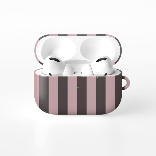 Strawberry Wafer AirPods Case featuring fine strawberry-pink polka dots above bold vertical strawberry-pink stripes on a cocoa-brown background.