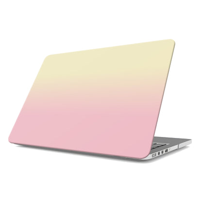 Pink and yellow MacBook case with soft sunset ombre gradient print on a slim hard shell Apple MacBook cover by Case & Charm.