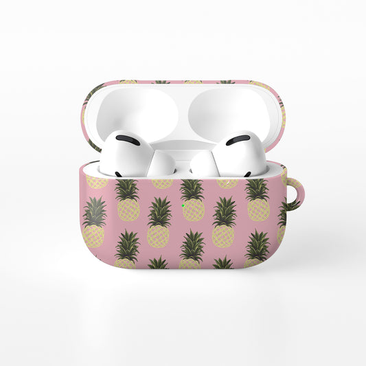 Pink pineapple AirPods case with yellow pineapple fruit print on a glossy Apple AirPods case by Case & Charm.