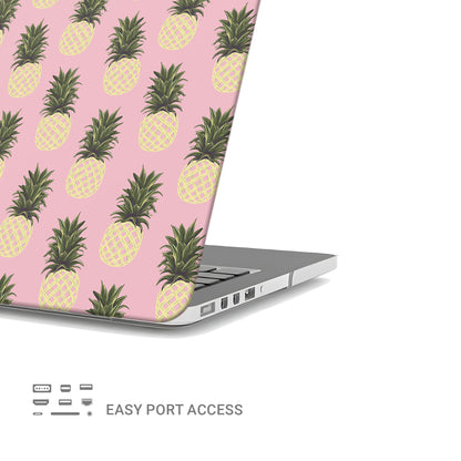 Pink pineapple MacBook case with yellow pineapple fruit print on a slim hard shell Apple MacBook cover by Case & Charm.