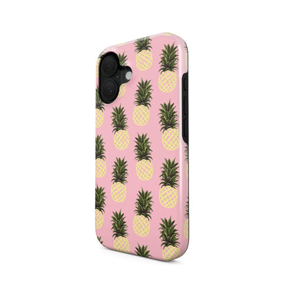 Pineapple tough phone case featuring yellow pineapple illustrations on a soft pink background with a fun tropical summer style.