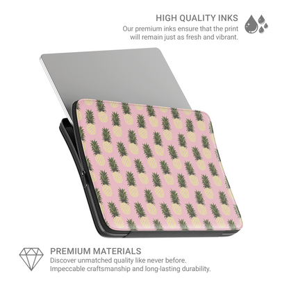 Pink pineapple laptop sleeve with yellow pineapple print on a vegan leather laptop case by Case & Charm.