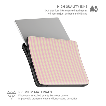 Pink and yellow striped laptop sleeve with vertical pastel stripe print on a vegan leather laptop case by Case & Charm.