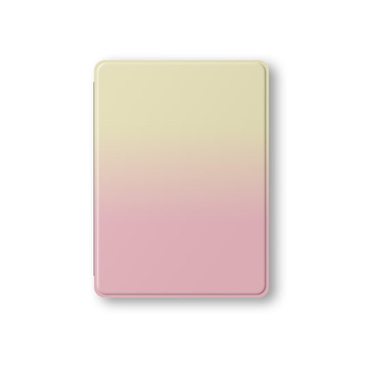 Pink and yellow iPad case with soft sunset ombre gradient print on a vegan leather Apple iPad folio case by Case & Charm.
