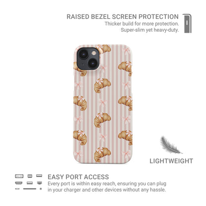 pink croissant phone case with bow pattern on blush stripe background cute aesthetic iphone 15 case bakery style design