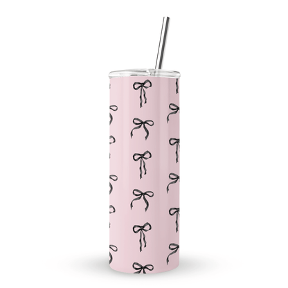 Ribbon Reverie Stainless Steel Tumbler with black satin bow design on blush pink background, double-wall insulated, reusable eco-friendly drinkware