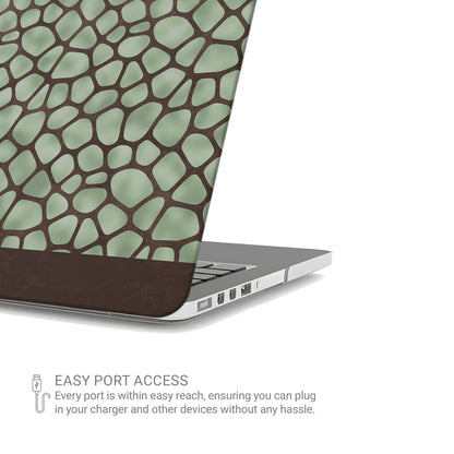 Mossy Mosaic MacBook Case with sage green giraffe spots outlined in chocolate brown from the Wild Atelier collection.