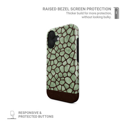Mossy Mosaic MagSafe Tough Phone Case with sage green giraffe spots outlined in chocolate brown from the Wild Atelier collection.
