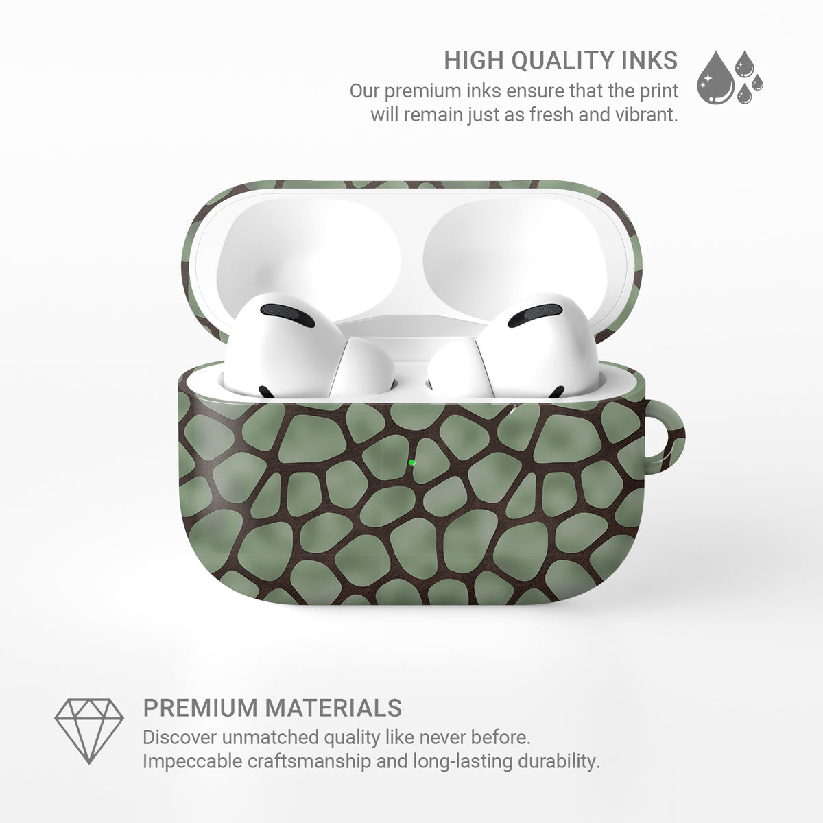 Mossy Mosaic AirPods Case with sage green giraffe spots outlined in chocolate brown from the Wild Atelier collection.