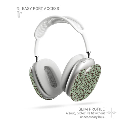 Mossy Mosaic AirPods Max Covers with sage green giraffe spots outlined in chocolate brown from the Wild Atelier collection.