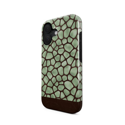 Mossy Mosaic Tough Phone Case with sage green giraffe spots outlined in chocolate brown from the Wild Atelier collection.
