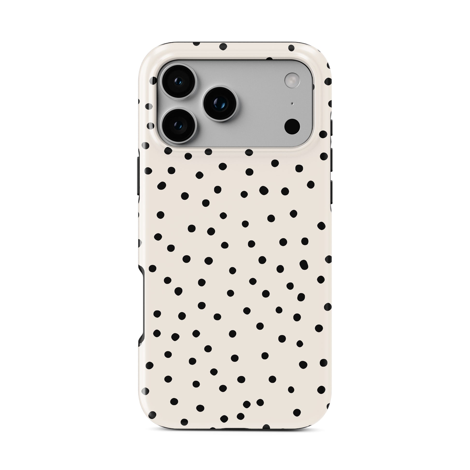 Cream polka dot tough phone case with black scattered dots on neutral background