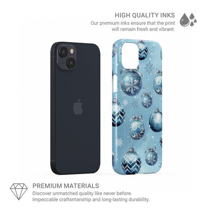 Pastel blue Christmas baubles with snowflakes and silver bows on a soft winter background, Case & Charm Snowdrop Baubles design