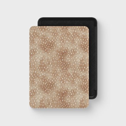 Fawn Fleck Kindle case in warm beige with irregular tan flecks and a soft neutral organic pattern.