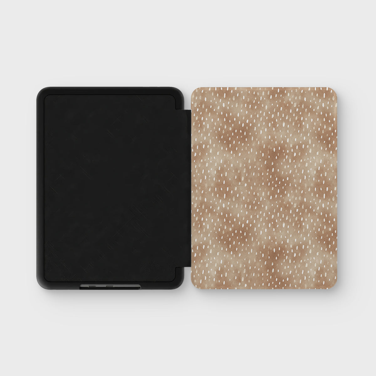 Fawn Fleck Kindle case in warm beige with irregular tan flecks and a soft neutral organic pattern.