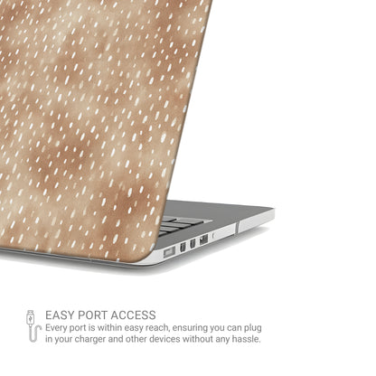 Fawn Fleck MacBook shell in warm beige with irregular tan speckles and a soft organic neutral pattern.