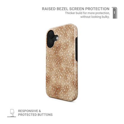 Fawn Fleck MagSafe Tough phone case in warm beige with irregular tan speckles and organic abstract marks.