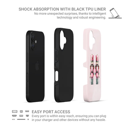 Glossy tough phone case with two pink Nutcracker soldiers on a blush background, dual layer style, Case & Charm Sugarplum Soldiers design