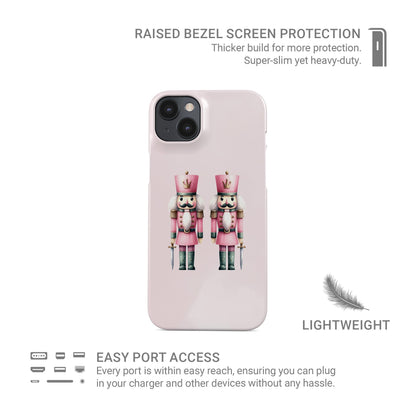 Two pink Nutcracker soldiers on a pink background, pastel Christmas Protective Phone case from Case and Charm.