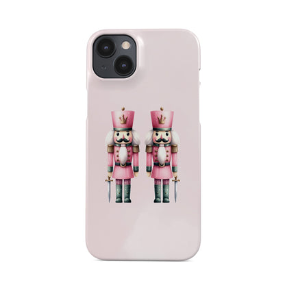 Two pink Nutcracker soldiers on a pink background, pastel Christmas Protective Phone case from Case and Charm.