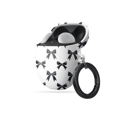 Google Pixel Buds case in Twilight Confetti design with bold black bow pattern on a white background, coquette-inspired protective earbuds cover.